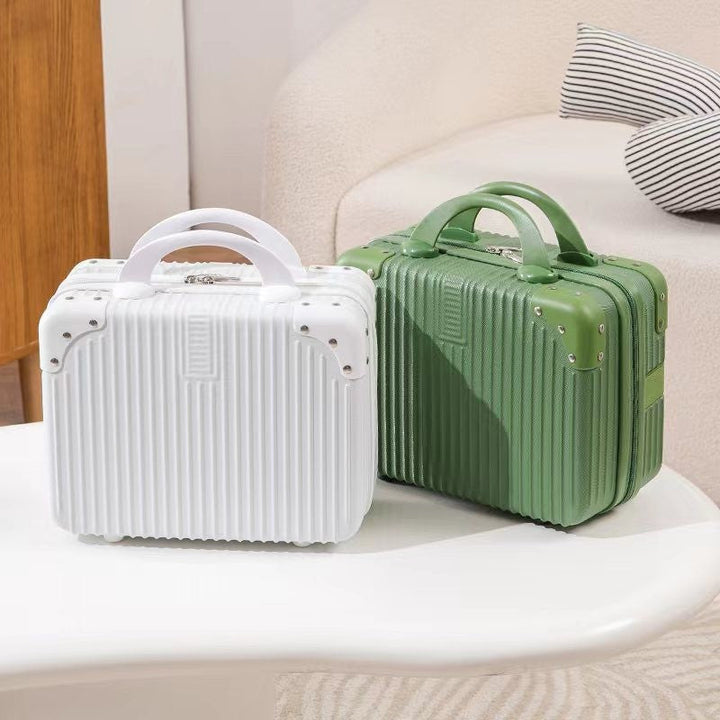 structured hard-shell travel cosmetic carry case with reinforced corner guards and ergonomic handle Bowlift