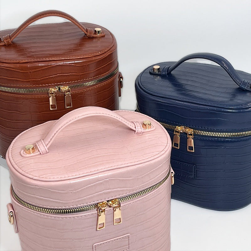 Cosmetic bag in elegant crocodile look by Bowlift